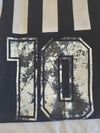Home football shirt close-up of number 10 print, worn effect on black and white stripes