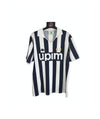 Home football shirt front view with upim logo and star badge, black and white stripes