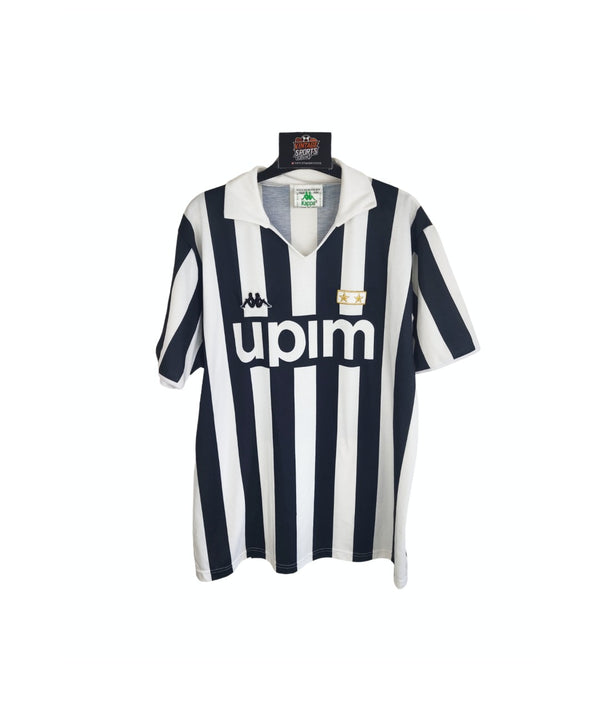 Home football shirt front view with upim logo and star badge, black and white stripes