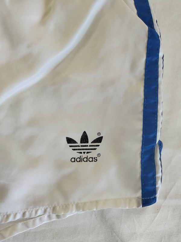 adidas vintage track shorts, white with blue side stripes and trefoil logo